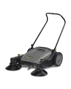 Kärcher professional push sweeper with dual side brushes, ergonomic handle, and large rear wheels for efficient floor cleaning in commercial and industrial spaces.